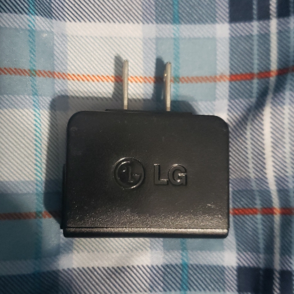 Black LG travel adapter phone charger box